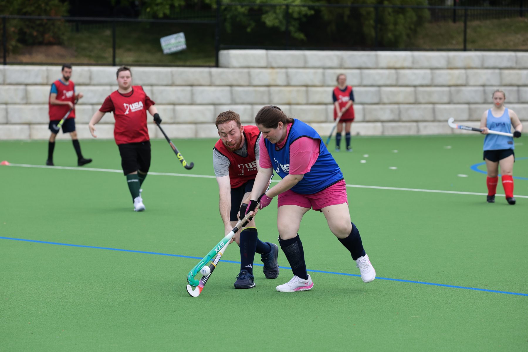 Team USA Hockey ii players contesting the ball